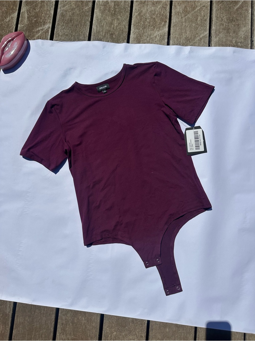 Express Women’s Short Sleeve Bodysuit in Deep Plum